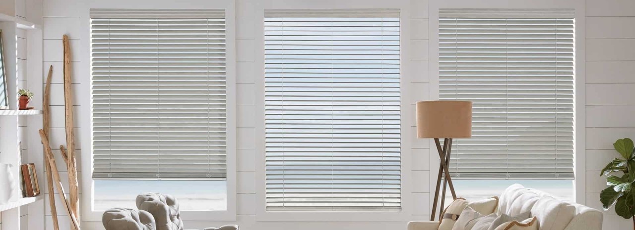 Faux wood window blinds near Bloomington, Illinois (IL), that offer durability and realistic finishes.